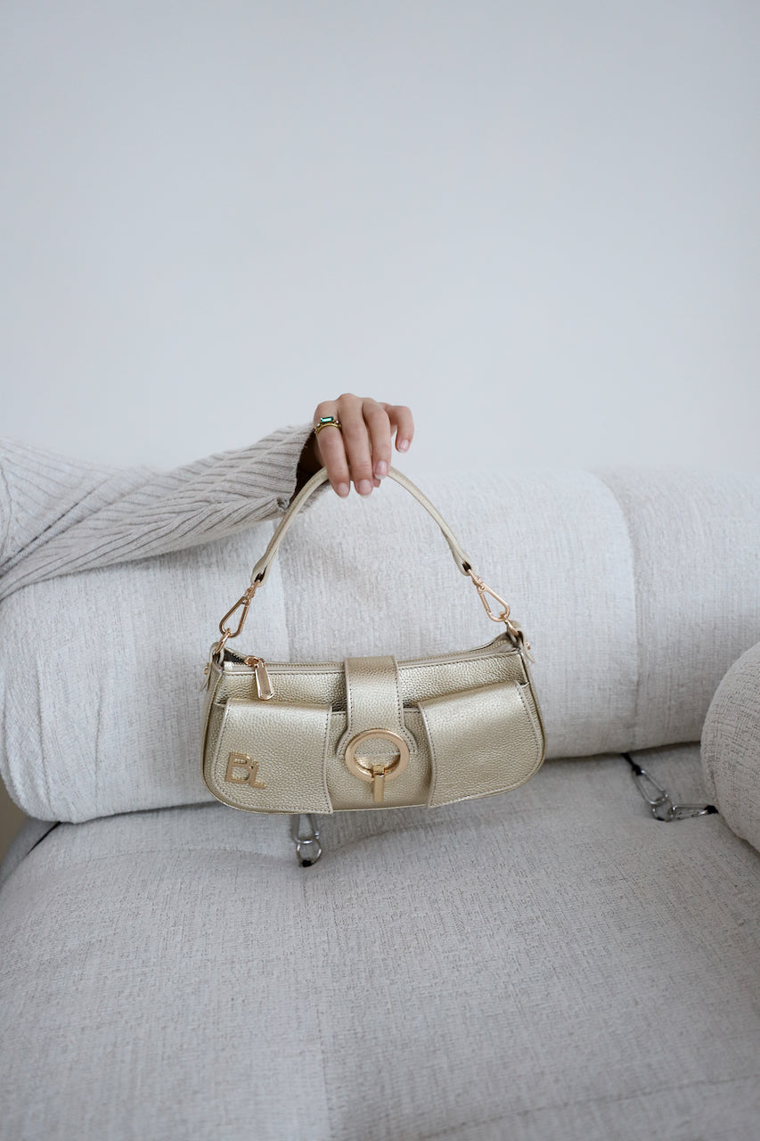 London | Tas Goud